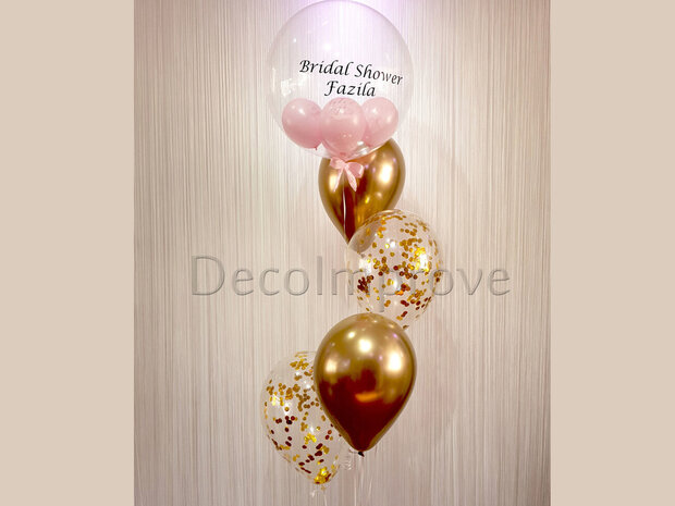 Goud confetti en bubble helium ballonnentros